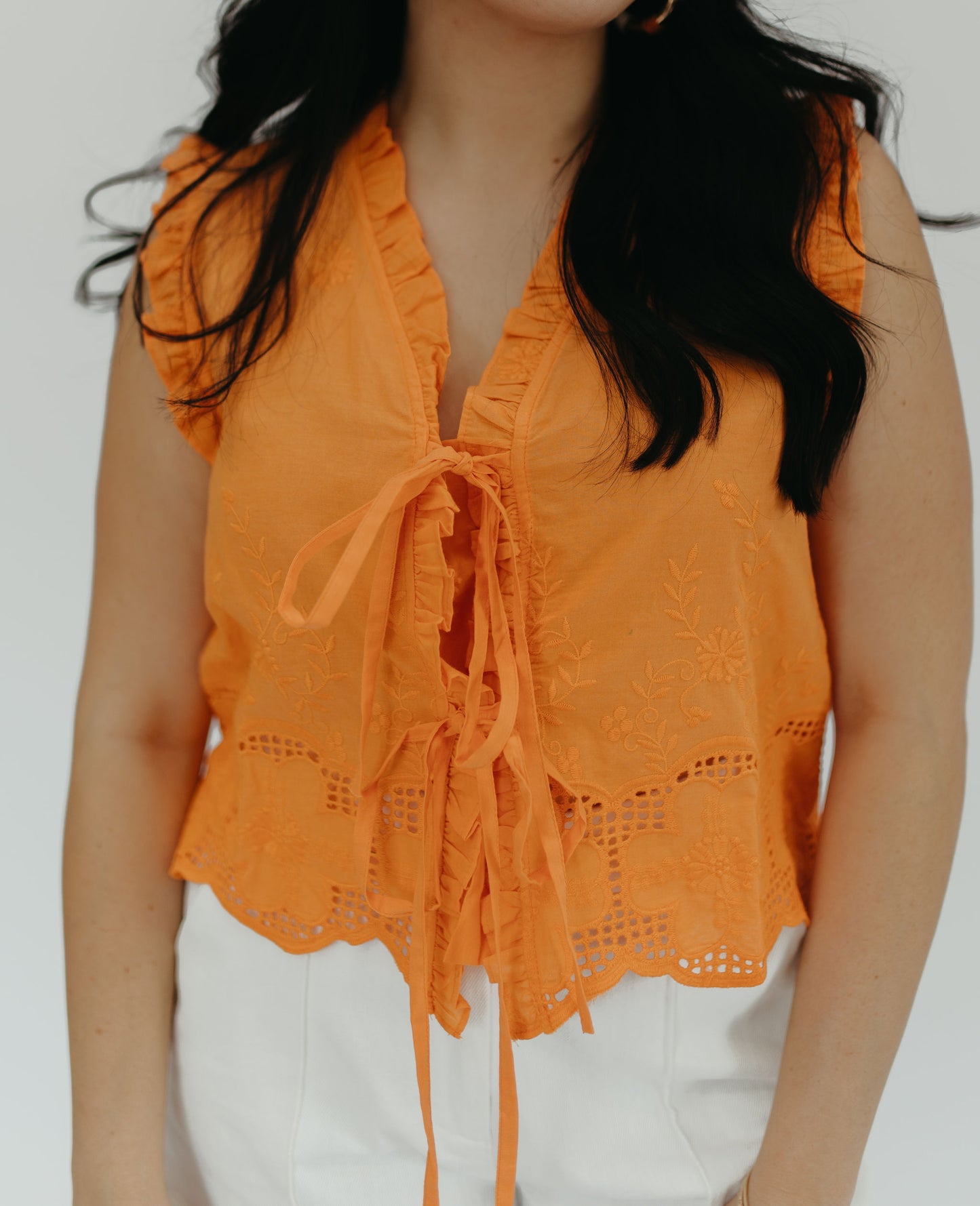 ORANGE EYELET TOP
