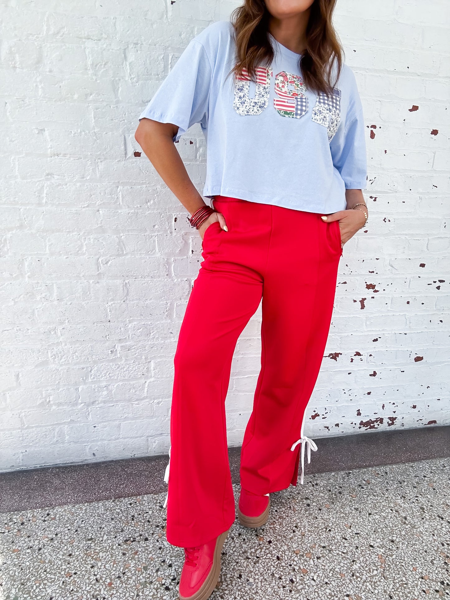 MOVING ON TRACK PANTS - RED