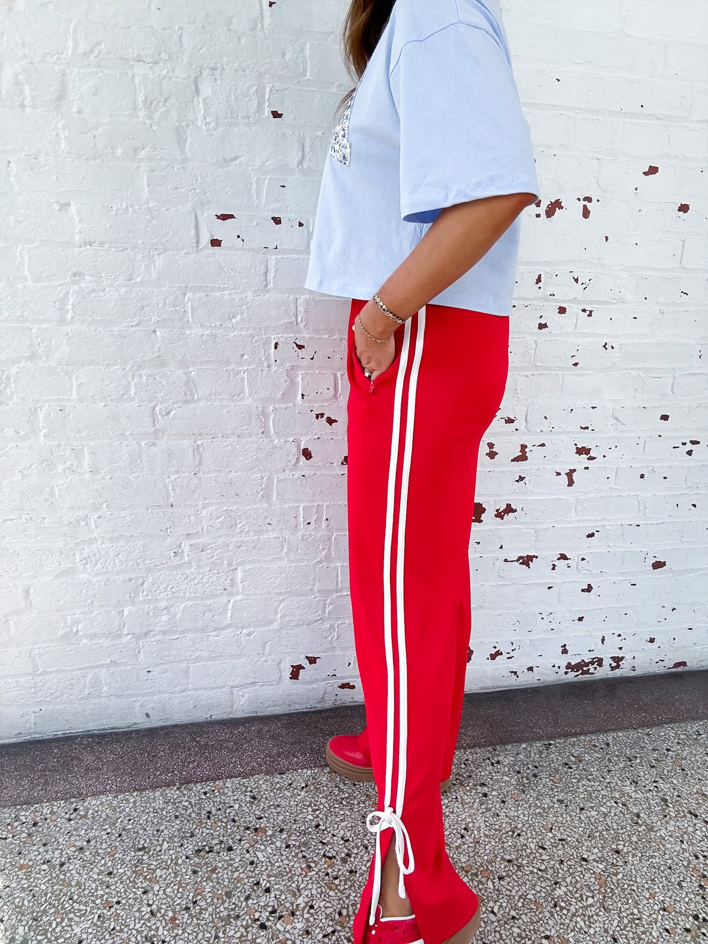 MOVING ON TRACK PANTS - RED