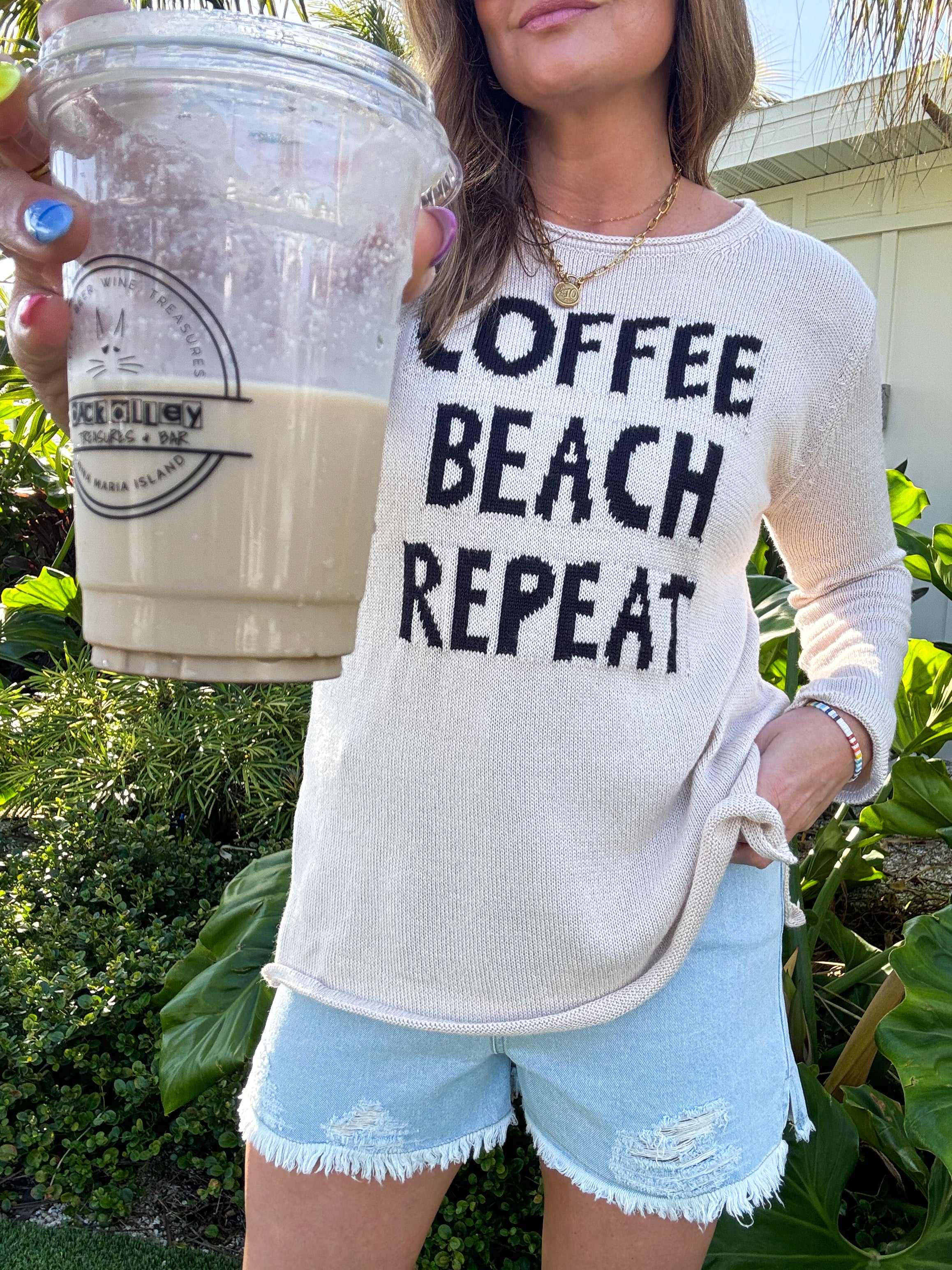 The Cozy Comfort of Coffee Beach Repeat Sweater: A Travel Essential