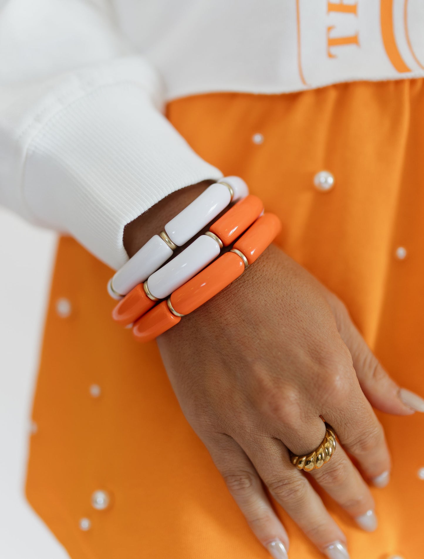 ORANGE & WHITE TUBE BRACELETS