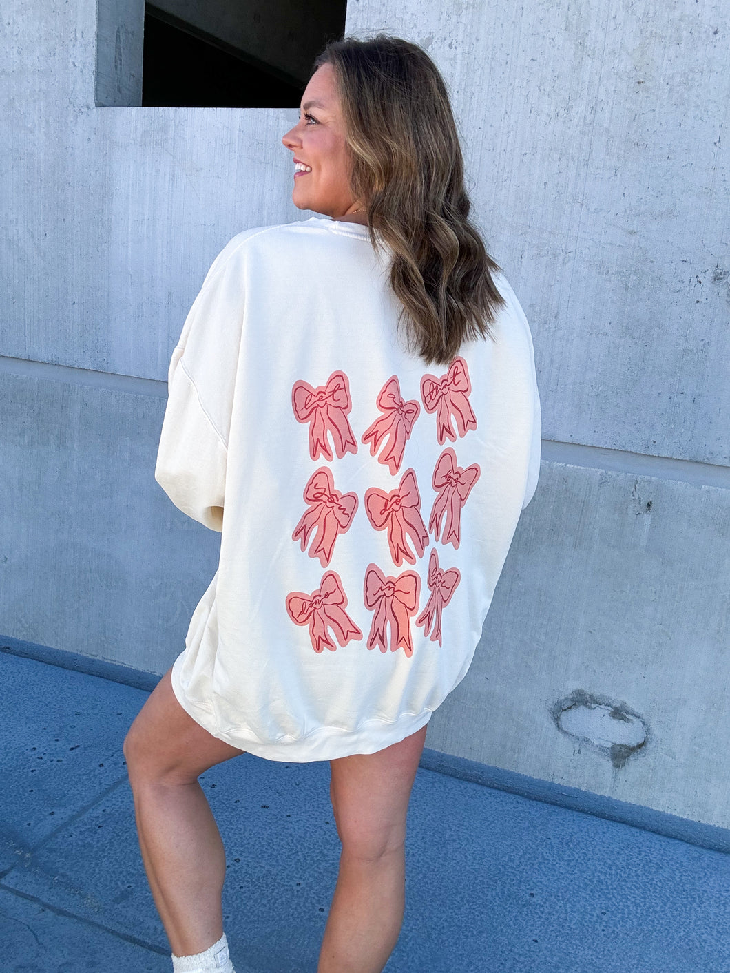 BE DONE IN LOVE BOW SWEATSHIRT