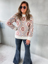 Load image into Gallery viewer, argyle sweater. cream sweater. ivory pullover. blue and red sweater. 
